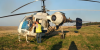 Поблизу Рівного активісти затримали гелікоптер, яким незаконно обробляли посіви соняшника