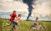UNICEF вразила світлина дітей, що граються на тлі палаючої нафтобази на Рівненщині 