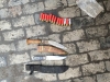 Житель Вараського району зберігав зброю, боєприпаси і бурштин