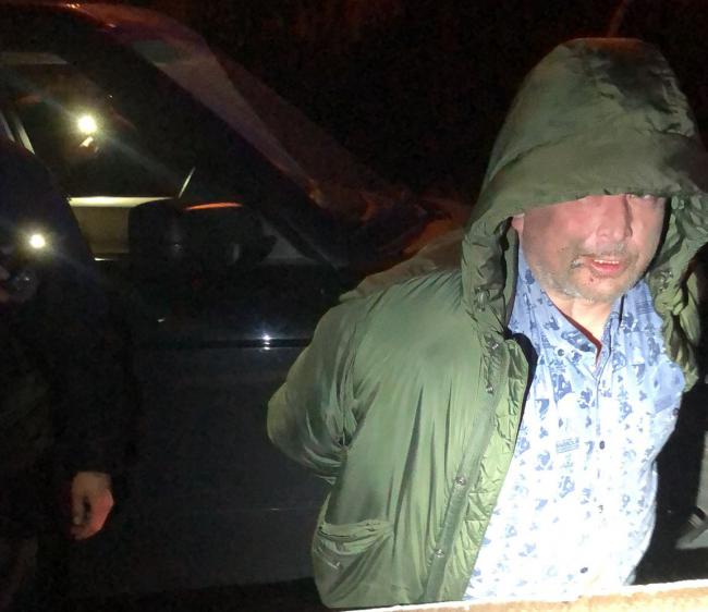 Адвокат Сергій Авраменко під час затримання поліцейськими